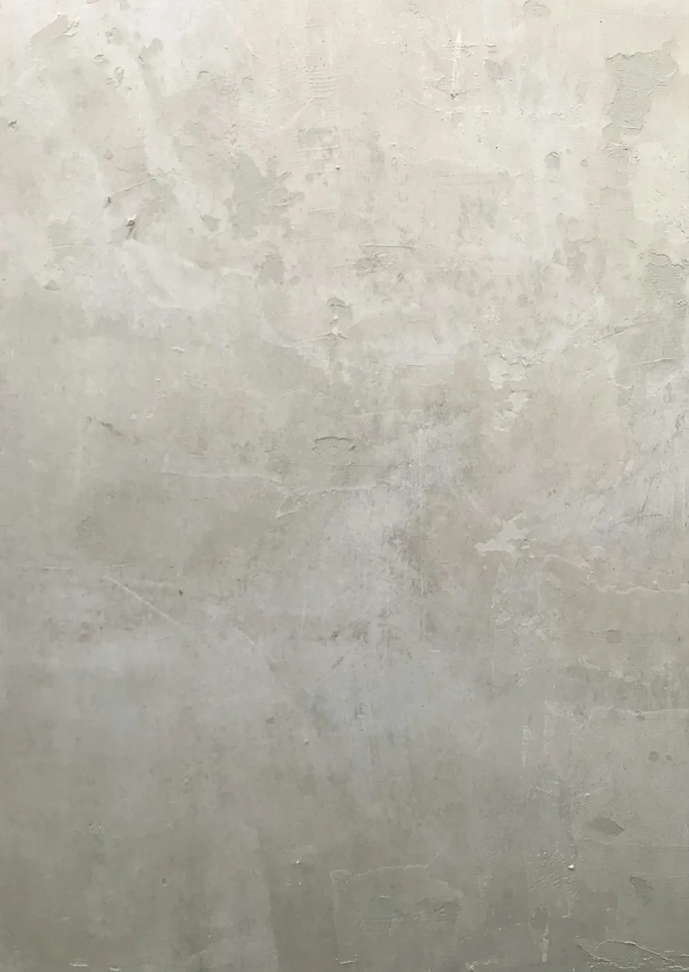 Parete in gesso lisciata a spatola, in luce naturale